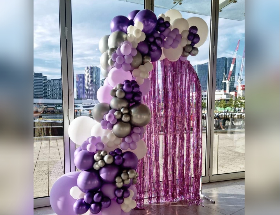 purple backdrop balloons